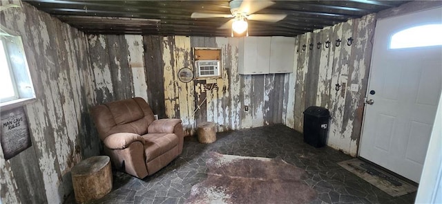 2251 Nemaha Rd, Cummings, KS 66016 - basement featuring stone floors and a ceiling fan