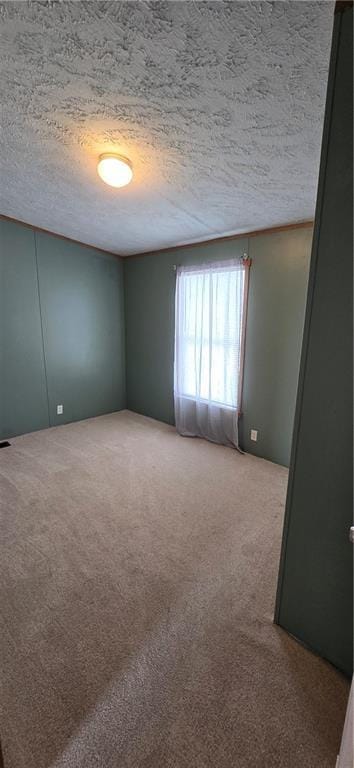 2251 Nemaha Rd, Cummings, KS 66016 - unfurnished room featuring carpet floors and a textured ceiling