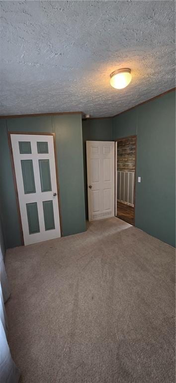 2251 Nemaha Rd, Cummings, KS 66016 - carpeted empty room with a textured ceiling