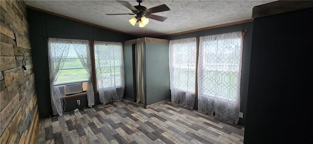 2251 Nemaha Rd, Cummings, KS 66016 - empty room featuring lofted ceiling, cooling unit, wood finished floors, a ceiling fan, and healthy amount of natural light