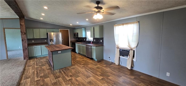 2251 Nemaha Rd, Cummings, KS 66016 - kitchen featuring appliances with stainless steel finishes, crown molding, butcher block countertops, dark wood finished floors, and a ceiling fan