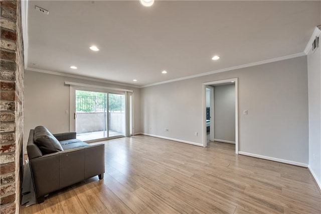 5008 Baltimore Ave Unit 102, Kansas City, MO 64112 - living area featuring crown molding, light wood-style flooring, and recessed lighting