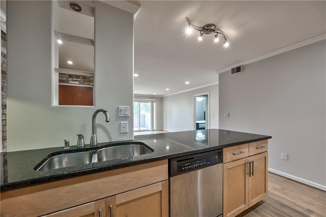 5008 Baltimore Ave Unit 102, Kansas City, MO 64112 - kitchen featuring stainless steel dishwasher, crown molding, dark stone counters, light wood-style floors, and light brown cabinetry