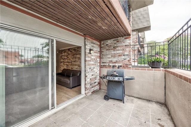 5008 Baltimore Ave Unit 102, Kansas City, MO 64112 - patio / terrace with grilling area