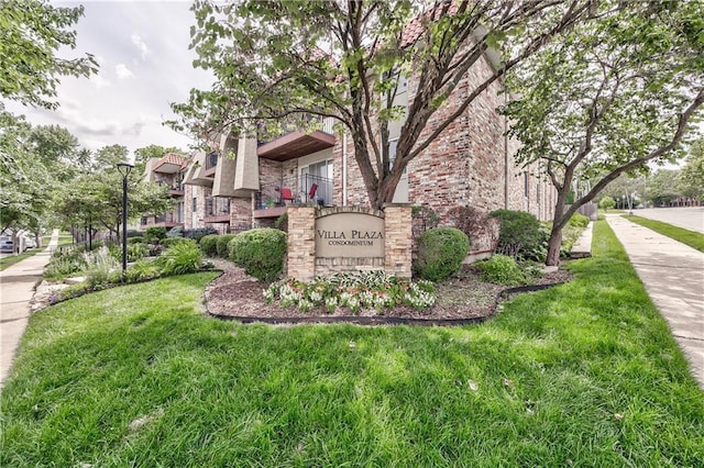 5008 Baltimore Ave Unit 102, Kansas City, MO 64112 - community sign featuring a yard