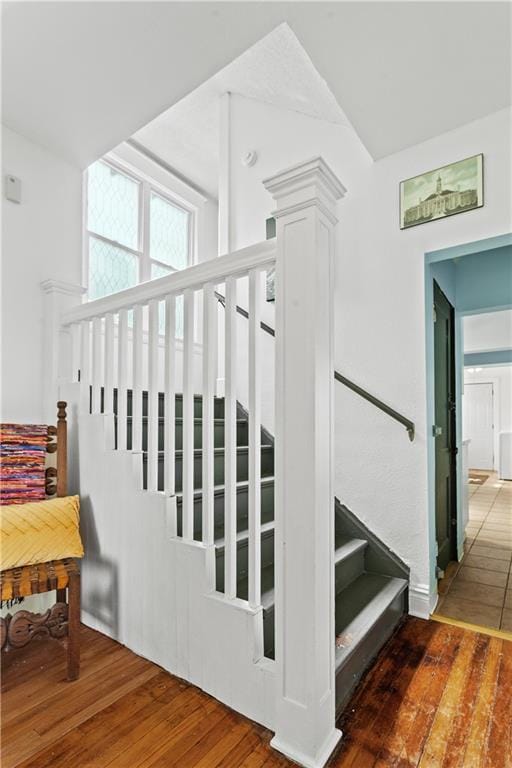 111 E Ruby Ave, Independence, MO 64050 - stairway with hardwood / wood-style flooring