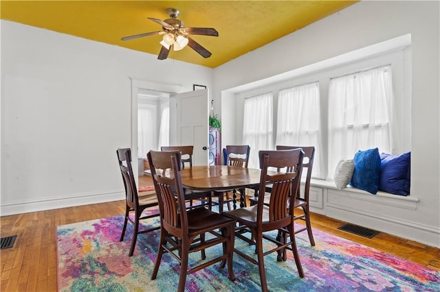 111 E Ruby Ave, Independence, MO 64050 - dining space with ceiling fan and wood finished floors