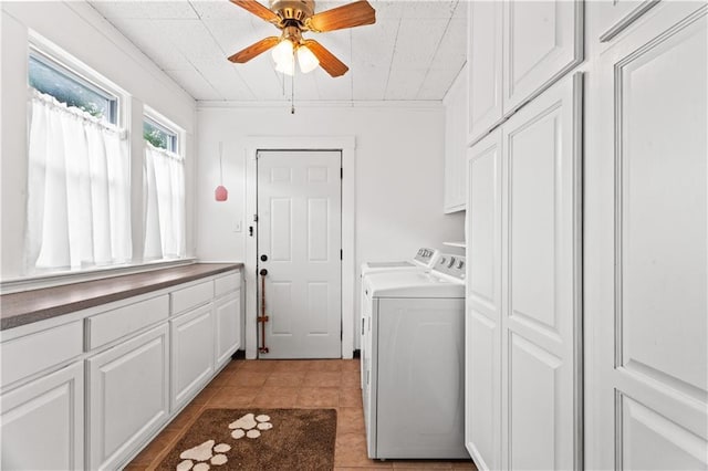 111 E Ruby Ave, Independence, MO 64050 - laundry area with cabinet space, separate washer and dryer, ceiling fan, and light tile patterned floors