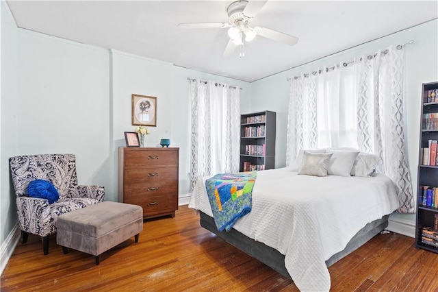 111 E Ruby Ave, Independence, MO 64050 - bedroom featuring wood finished floors and a ceiling fan