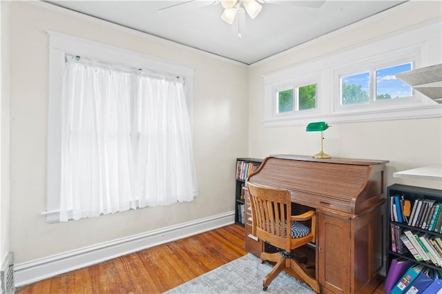 111 E Ruby Ave, Independence, MO 64050 - office space featuring a ceiling fan, wood finished floors, and crown molding
