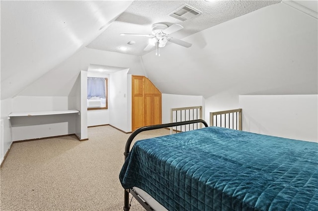 111 E Ruby Ave, Independence, MO 64050 - bedroom featuring light carpet, lofted ceiling, ceiling fan, and a textured ceiling
