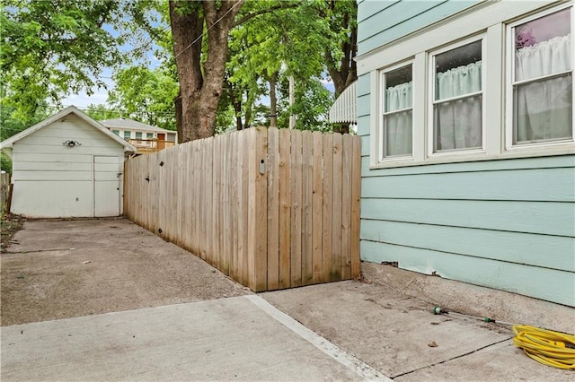 111 E Ruby Ave, Independence, MO 64050 - view of patio featuring a shed