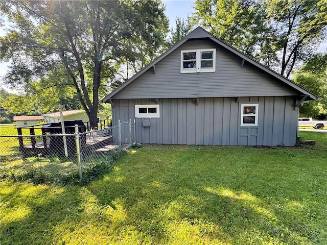 110 W 7th St, Knob Noster, MO 65336 - view of home's exterior featuring board and batten siding