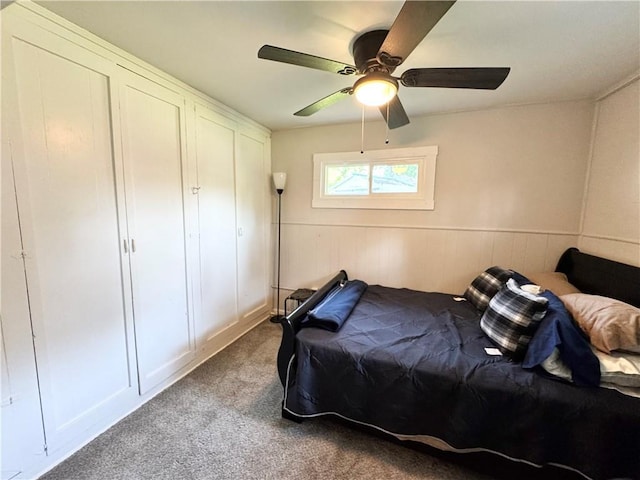110 W 7th St, Knob Noster, MO 65336 - carpeted bedroom featuring a ceiling fan