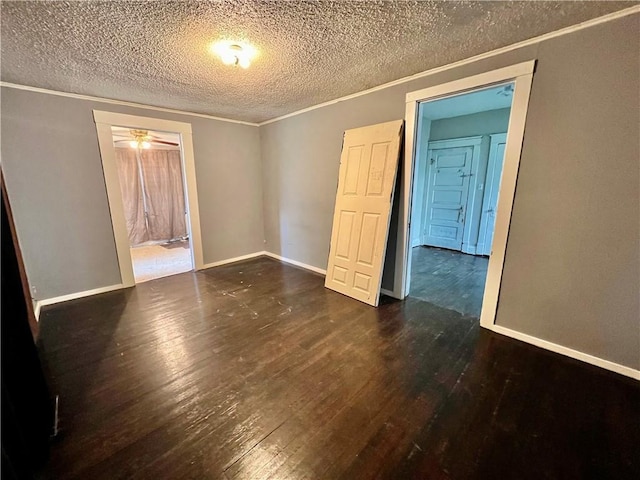 522 S 2nd St, Independence, KS 67301 - spare room featuring hardwood / wood-style floors, a textured ceiling, and crown molding