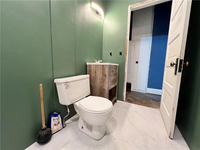 522 S 2nd St, Independence, KS 67301 - bathroom with toilet and vanity