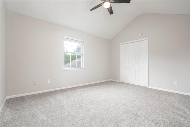 4612 Whispering Winds Dr Unit B, Lees Summit, MO 64064 - unfurnished bedroom with carpet, vaulted ceiling, a closet, and a ceiling fan