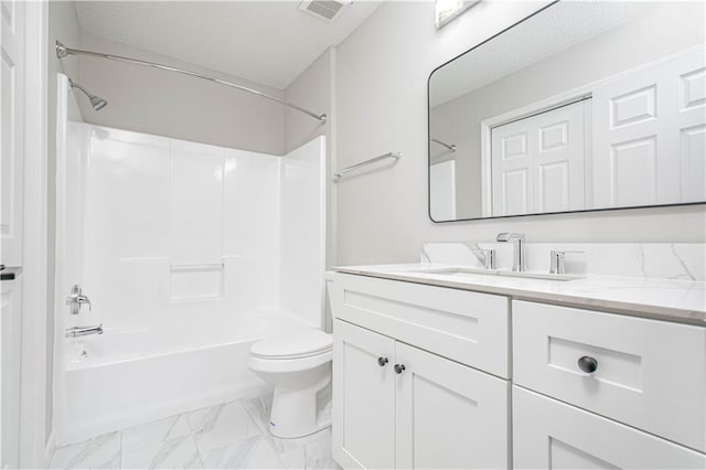 4612 Whispering Winds Dr Unit B, Lees Summit, MO 64064 - bathroom featuring vanity, tub / shower combination, marble look tile flooring, and a textured ceiling