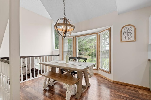 2433 Post Oak Rd, Olathe, KS 66061 - dining area with a chandelier, healthy amount of natural light, wood finished floors, and a textured ceiling