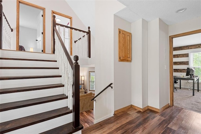 2433 Post Oak Rd, Olathe, KS 66061 - stairs with wood finished floors and a textured ceiling