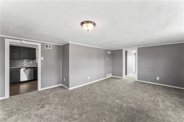 1202 E 23rd St S, Independence, MO 64055 - empty room with carpet floors and crown molding