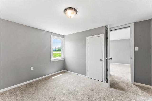 1202 E 23rd St S, Independence, MO 64055 - unfurnished bedroom featuring carpet flooring