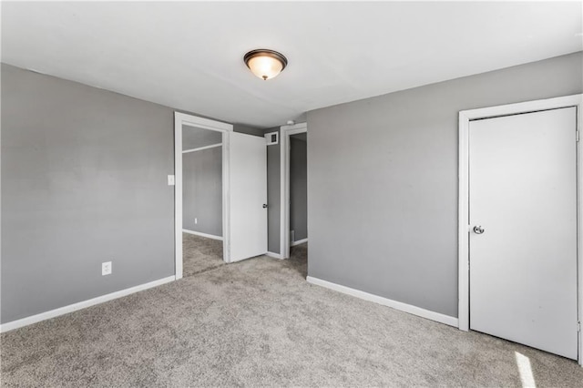 1202 E 23rd St S, Independence, MO 64055 - unfurnished bedroom with carpet flooring and a closet