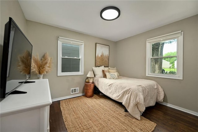 6217 Glenwood St, Mission, KS 66202 - bedroom featuring baseboards and wood finished floors