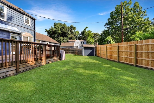 5217 Birch St, Roeland Park, KS 66205 - fenced backyard featuring a storage unit