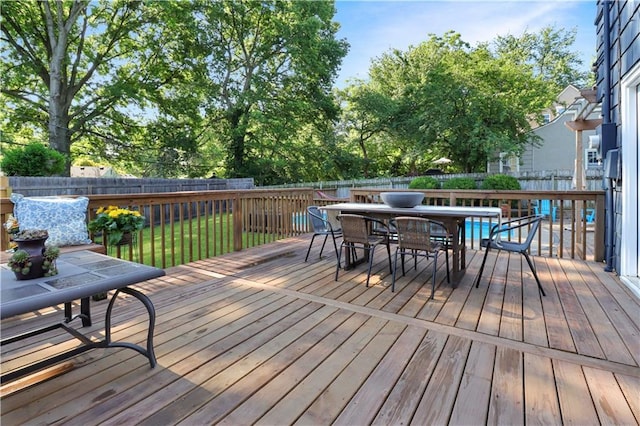 5217 Birch St, Roeland Park, KS 66205 - deck featuring outdoor dining space and a fenced backyard