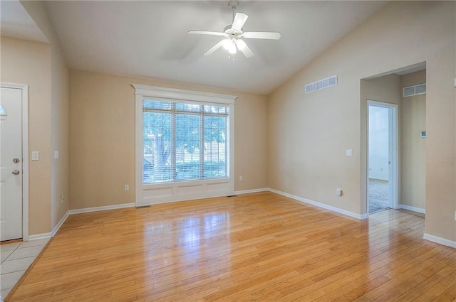15730 S Brentwood St Unit 2602, Olathe, KS 66062 - empty room featuring light wood-style floors, vaulted ceiling, and a ceiling fan