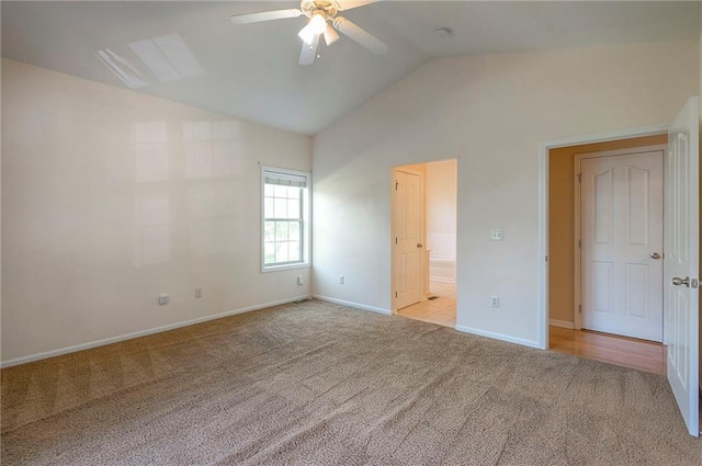 15730 S Brentwood St Unit 2602, Olathe, KS 66062 - unfurnished bedroom with light carpet, lofted ceiling, ensuite bathroom, and a ceiling fan