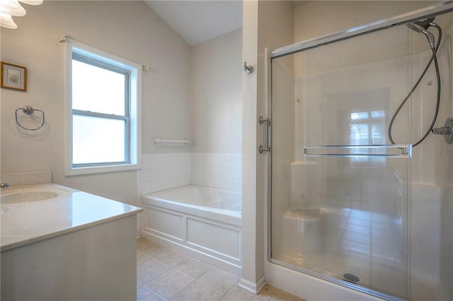 15730 S Brentwood St Unit 2602, Olathe, KS 66062 - full bathroom featuring tile patterned flooring, a shower stall, a bath, and vanity