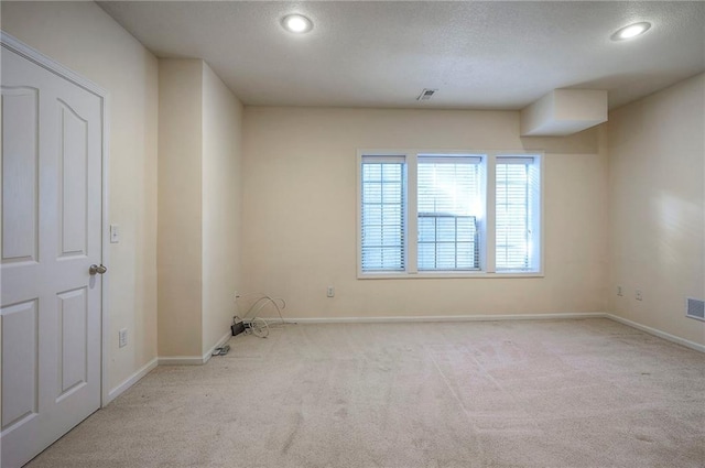 15730 S Brentwood St Unit 2602, Olathe, KS 66062 - carpeted empty room with recessed lighting and a textured ceiling