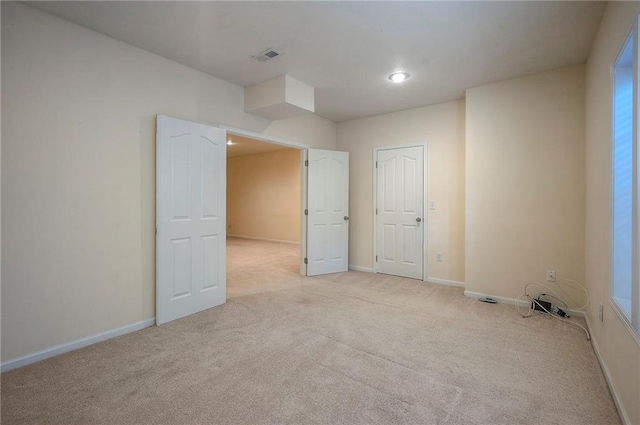 15730 S Brentwood St Unit 2602, Olathe, KS 66062 - spare room with light colored carpet and recessed lighting