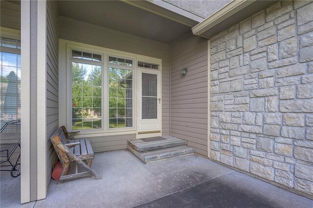 15730 S Brentwood St Unit 2602, Olathe, KS 66062 - property entrance with stone siding