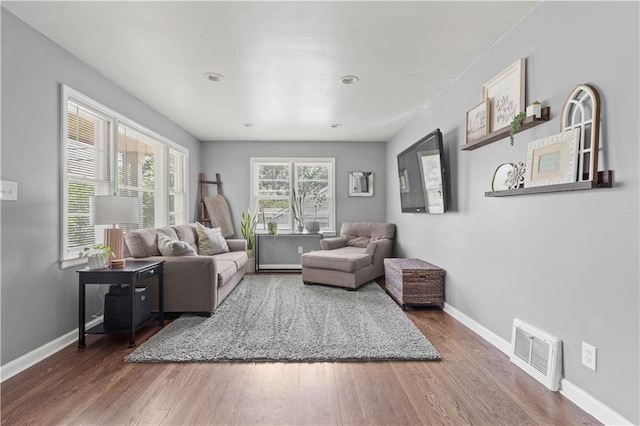7801 W 55th Ter, Overland Park, KS 66202 - living room featuring baseboards and wood finished floors