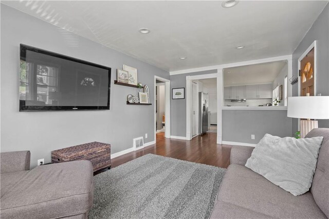 7801 W 55th Ter, Overland Park, KS 66202 - living room featuring dark wood-type flooring and recessed lighting