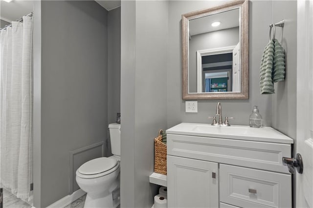 7801 W 55th Ter, Overland Park, KS 66202 - bathroom with vanity, marble look tile flooring, and a shower with shower curtain