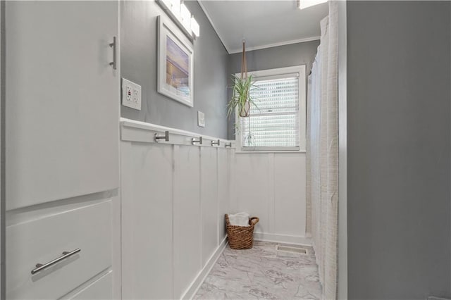 7801 W 55th Ter, Overland Park, KS 66202 - full bathroom with marble finish flooring, crown molding, and a shower with shower curtain