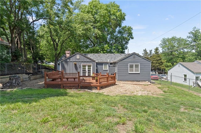 7801 W 55th Ter, Overland Park, KS 66202 - back of house with a deck, a chimney, and board and batten siding