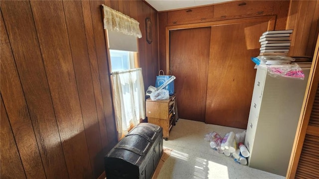 304 N Mckinley St, Weir, KS 66781 - doorway featuring wooden walls and carpet