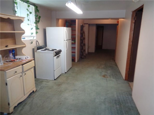 11401 E Scarritt Ave, Sugar Creek, MO 64054 - kitchen featuring white appliances, light carpet, and light countertops