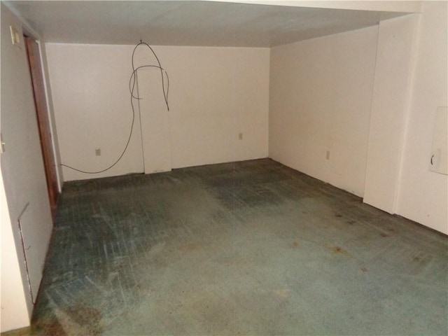 11401 E Scarritt Ave, Sugar Creek, MO 64054 - spare room featuring dark colored carpet