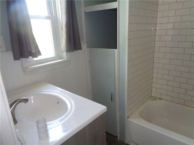 11401 E Scarritt Ave, Sugar Creek, MO 64054 - full bathroom with vanity and bathing tub / shower combination