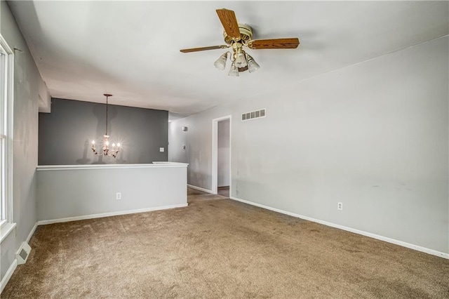 508 NE Shiloh Cir, Blue Springs, MO 64014 - carpeted spare room featuring a chandelier and ceiling fan