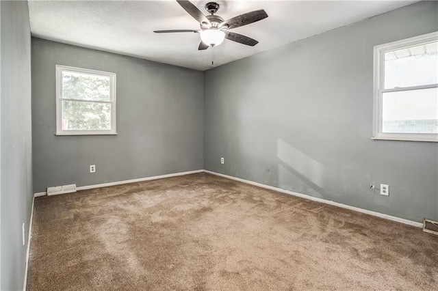 508 NE Shiloh Cir, Blue Springs, MO 64014 - carpeted empty room with ceiling fan and baseboards