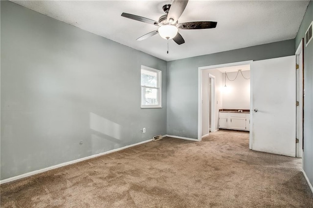 508 NE Shiloh Cir, Blue Springs, MO 64014 - unfurnished bedroom with carpet, ensuite bathroom, and a ceiling fan