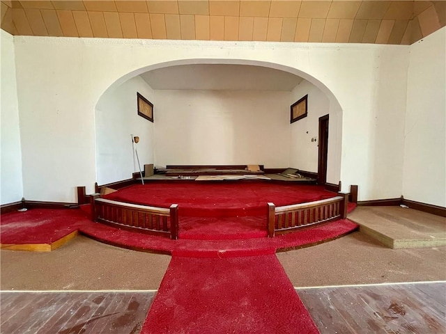 130 W 2nd St, Clearmont, MO 64431 - miscellaneous room with arched walkways and carpet flooring