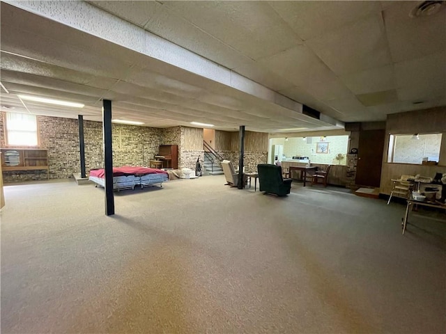 130 W 2nd St, Clearmont, MO 64431 - below grade area with carpet flooring and a fireplace